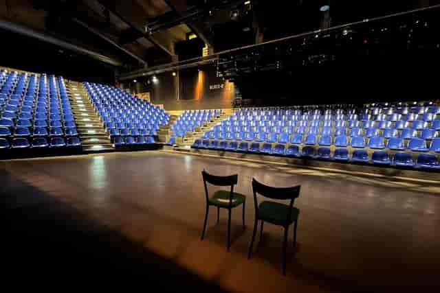 WERK7 theater amphitheater stage for intimate fireside chats and keynote event venues.