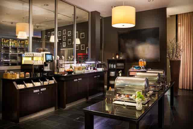 Contemporary hotel buffet area for corporate networking and professional catering events.