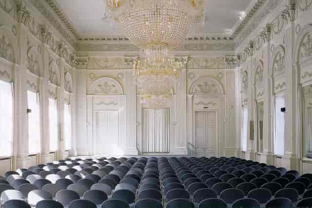 Max-Joseph-Saal theater-style ballroom for formal corporate presentations and keynote events.
