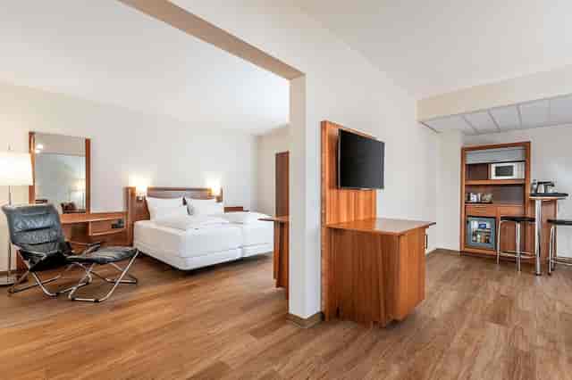 International Restaurant suite with workstation for business travel and conference events.