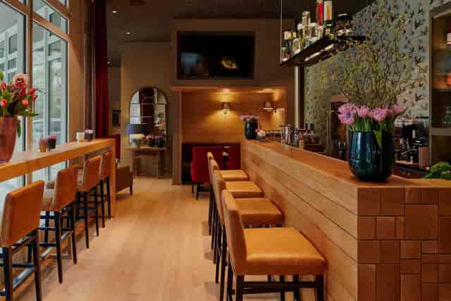 Upscale breakout space at Hotel Rothof with bar seating for VIP networking and corporate events.