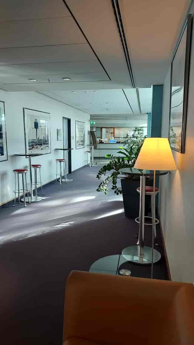 Municon conference center pre-function space with bar seating for networking and business events.