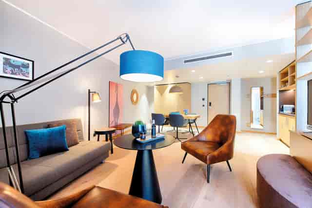 Heaven Suite at NYX Hotel Munich: luxury boardroom for VIP meetings and corporate strategy sessions.