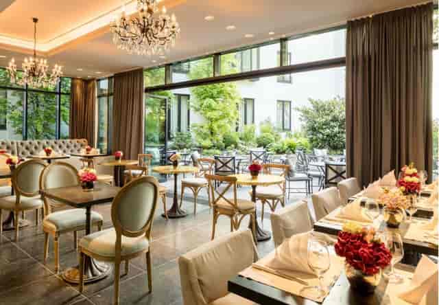 Palace Wintergarten Munich: glass-walled venue for upscale weddings and networking events.