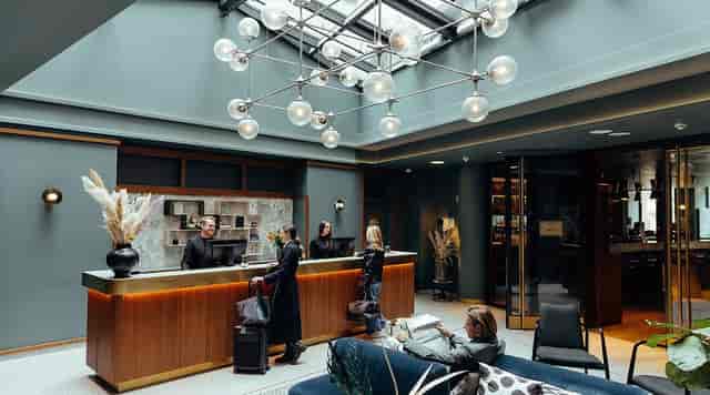 Modern AMANO Bar Munich hotel lobby for executive retreats and boutique board meetings.