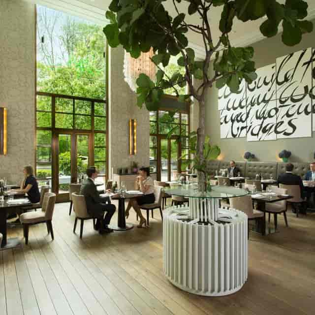 Private Dining Room in Florio with natural light for executive lunches and networking events.