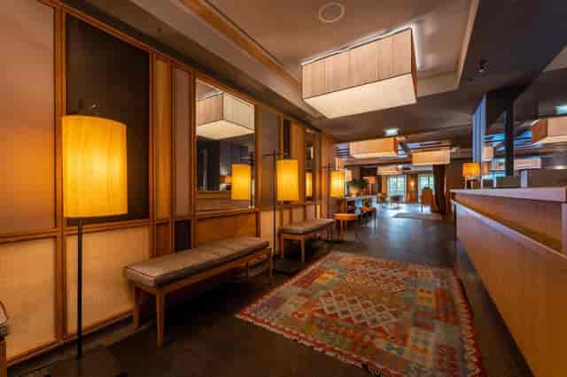 LOUIS Hotel lounge featuring ambient lighting, ideal for boutique event registration or networking.