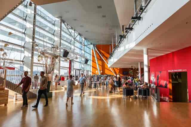 Rhine Foyer at New Luxor Theater: glass-fronted space for corporate events and networking.