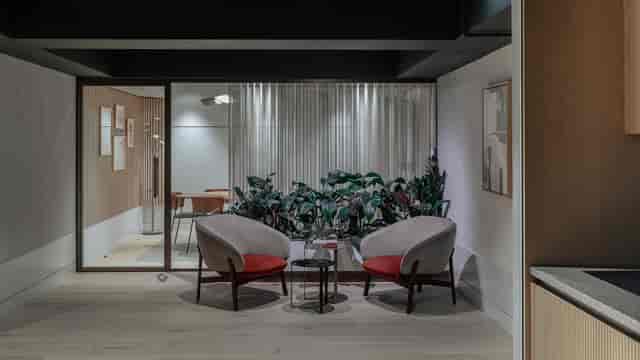 Chic Meeting Room 7 with contemporary armchairs for corporate events or brainstorming sessions.