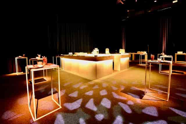 The Dome event hall with illuminated buffet for corporate networking and cocktail reception.