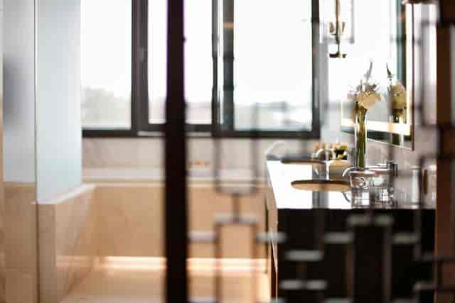 Upscale Tangla Hotel Brussels executive bathroom for premium corporate event VIP suites.