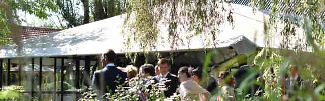 Clear-span marquee garden reception at Terrasse in Aromate for upscale outdoor events.