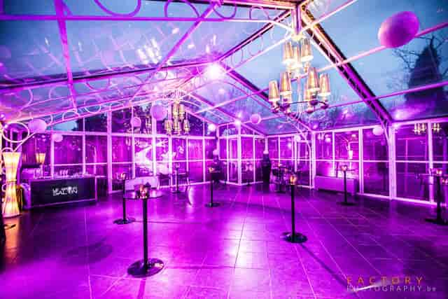 Magenta uplighting at Aromate Orangerie cocktail reception, ideal for networking events.
