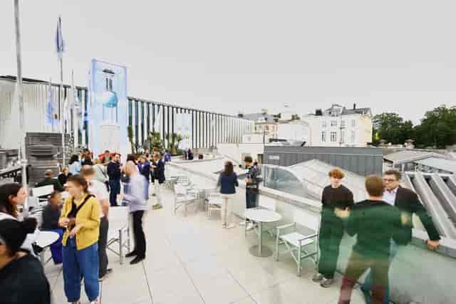 Bozar Rooftop venue featuring minimalist seating for outdoor networking events.