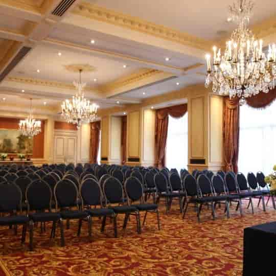 Elegant ballroom at Le Plaza conference center for corporate events and wedding ceremonies.