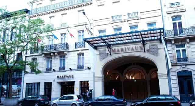 Federico Fellini at Hotel Marivaux: grand archway entrance for corporate events and galas.