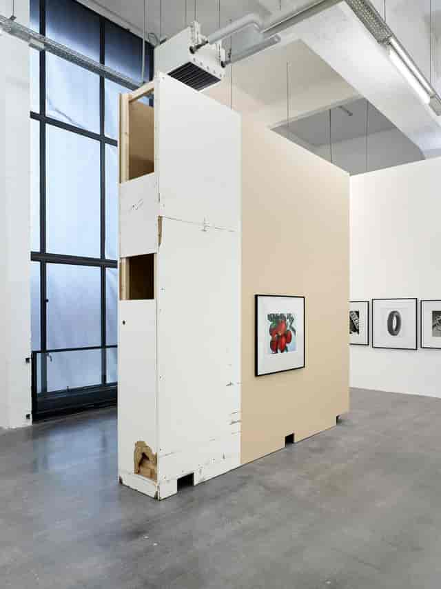 WIELS modern art museum exhibition space with unfinished plywood walls for event gallery rental.