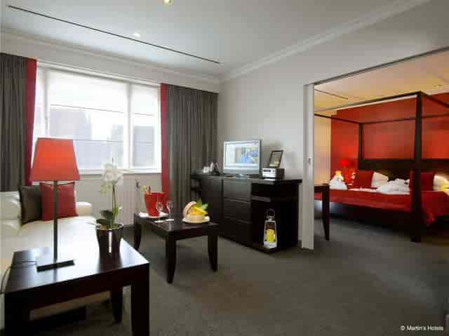 VIP hospitality suite with living area for private meetings and luxury travel at Bronze Brussels.
