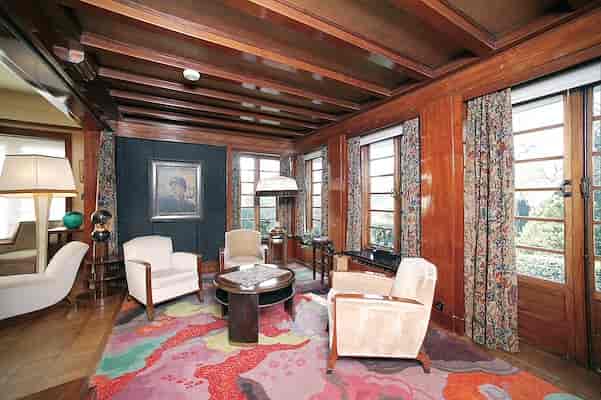 The Vestibule at Van Buuren Museum: historic wood-paneled VIP boardroom for private meetings.