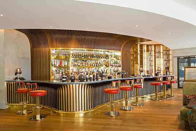 Sofitel Brussels Lobby bar featuring luxury architectural lighting for VIP and networking events.