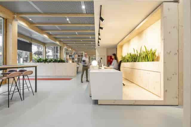 Modern biophilic reception at Tour & Taxis, ideal for delegate registration and networking events.