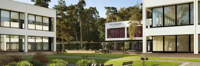 Brasserie 135 at Dolce La Hulpe: modern corporate retreat venue with green space for event hosting.