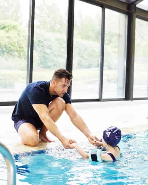 Corporate team building at Aspria Royal La Rasante wellness swimming pool.