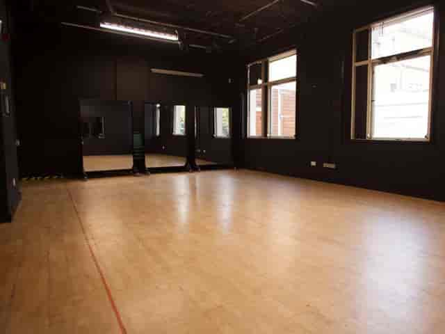 Clean Break studio space with hardwood floors for creative workshops and rehearsals.