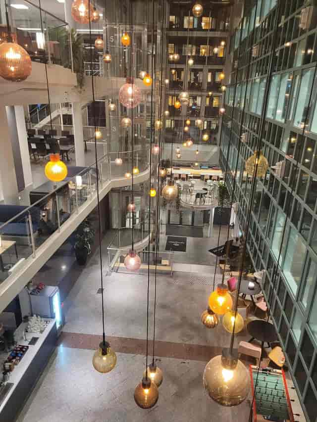 Modern industrial atrium at Think Big, Epicenter Oslo, perfect for networking events and receptions.