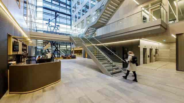 Modern atrium at Skøyen Atrium for corporate networking reception and event registration.