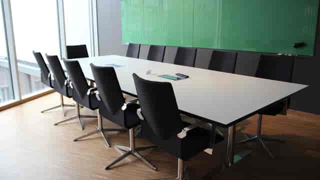 Modern Oslo Science Park boardroom with natural light for professional corporate meetings.