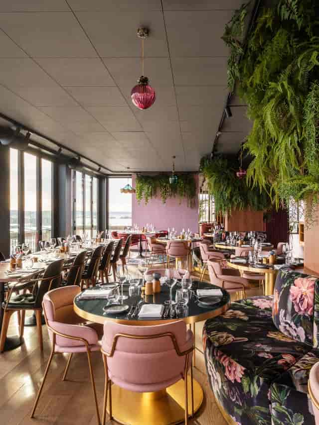 Upscale Clarion Hotel Oslo restaurant with biophilic design for networking events and dinners.