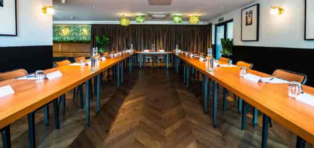 U-shape boardroom setup in The Comet Hotel Botanical Room for professional corporate meetings.