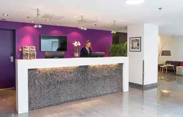 Modern reception desk at Thon Hotel Panorama for corporate events and conference check-in.