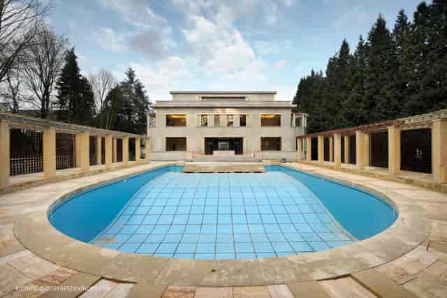 Villa Empain outdoor venue with central water feature for luxury galas and cocktail receptions.