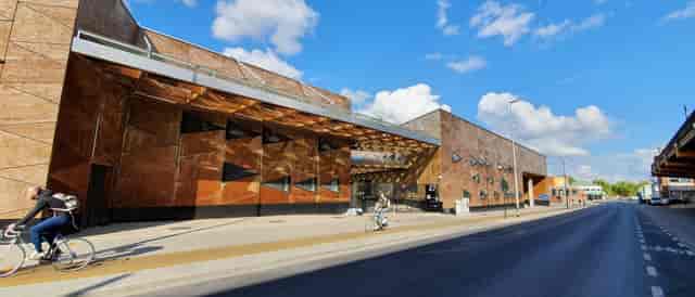 Modern Greenbizz business center with striking facade for corporate events and professional meetings.