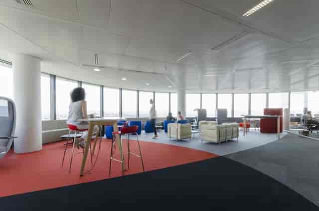 Bright, modern meeting room with modular lounge seating for collaborative business events.
