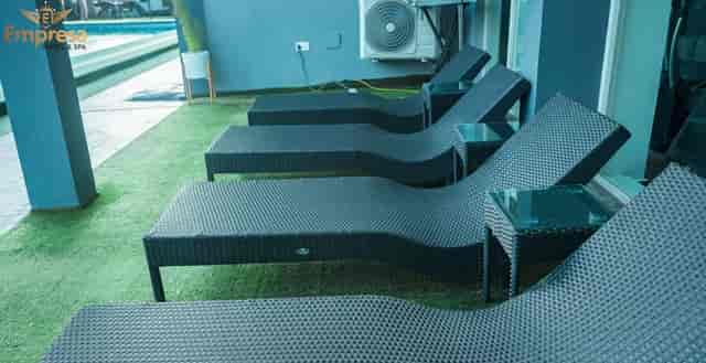 Pool hall event space at Empresa Hotel with synthetic turf, ideal for corporate networking and mixers.