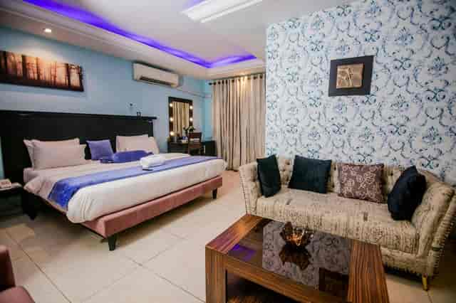 Executive suite with dedicated workspace for business travel and corporate meetings.
