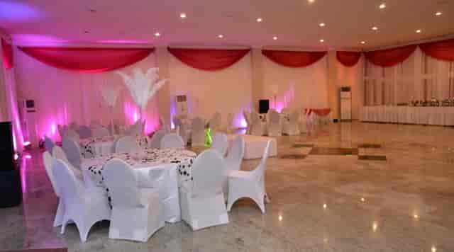 Karma Hotel ballroom gala setup with feather centerpieces for banquet events.