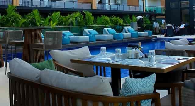 Upscale poolside restaurant with lounge seating for incentive receptions and corporate events.