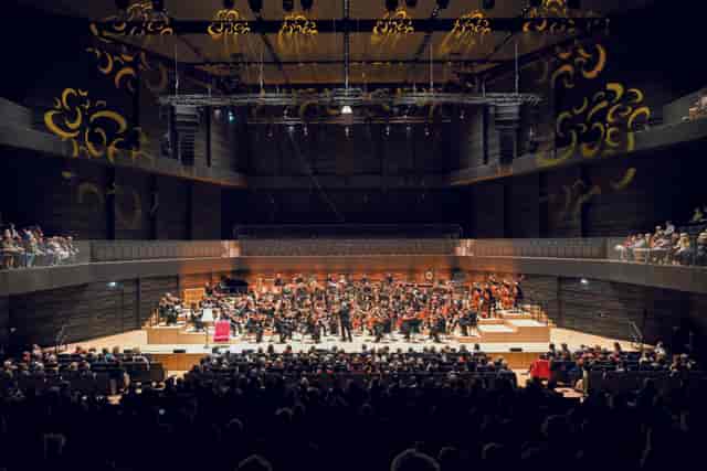 Isarphilharmonie concert hall stage for large plenary sessions and keynote events.