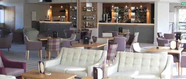 York Golf Club dining room with lounge seating for networking events and corporate meetings.