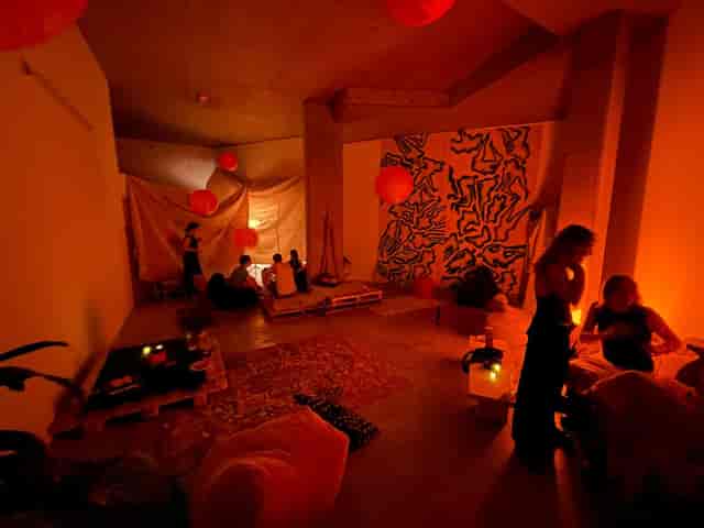 Cozy event space with warm lighting for intimate gatherings and networking.