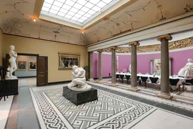 Gallery Corridor gala dinner venue with architectural details for luxury corporate events.