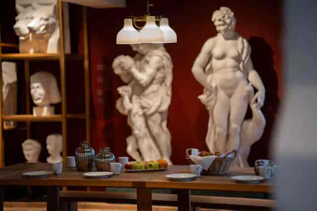 Classical sculpture backdrop in Hall of Paintings, Carlsberg Venues for VIP meetings and dining.