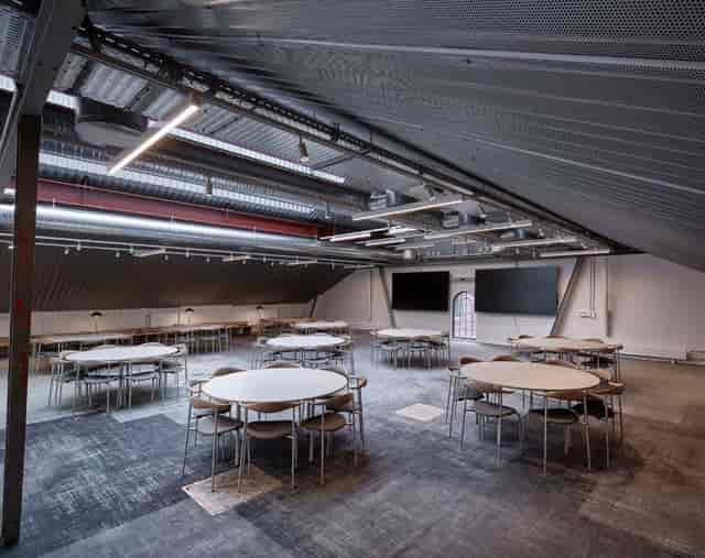 Ottilia Hall: industrial-chic event space with exposed ceilings for workshops and conferences.