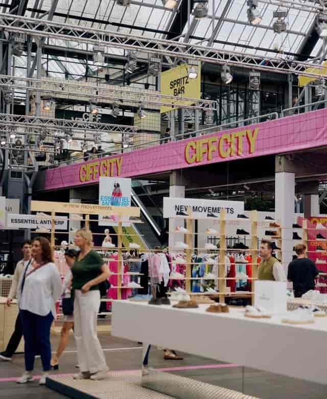 Retail pop-up showroom at CIFF trade show with modular shelving for fashion brand exhibition.