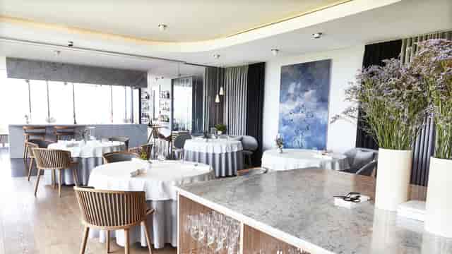 Upscale Geranium restaurant dining room for intimate corporate luncheons and board meetings.