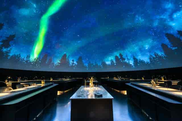 Alchemist immersive 360-degree projection dome for high-end corporate events and gala banquets.